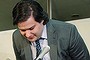 Mark Karpeles, president of MtGox bitcoin exchange bows his head during a press conference in Tokyo on February 28, 2014. The troubled MtGox Bitcoin exchange filed for bankruptcy protection in Japan on February 28, with its chief executive saying it had lost nearly half a billion dollars worth of the digital currency in a possible theft.  AFP PHOTO / JIJI PRESS    JAPAN OUT