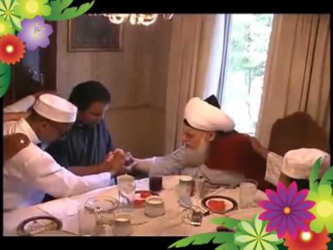 Muhammad Ali taking Bayah with Shaikh Muhammad Hisham Kabbani (2001)