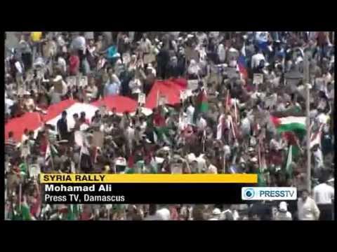 Syrians Rally for Assad on 65th Anniversary of Ba'ath Party