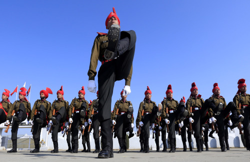 Newly graduated soldiers of the Jammu and Kashmir Light Infantry march during their commencement parade at a military base on the outskirts of Srinagar, India, Saturday, March 8, 2014. (AP Photo/Dar Y