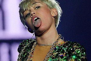 Singer Miley Cyrus performs during her Bangerz tour at the MGM Grand Garden Arena on March 1, 2014 in Las Vegas, Nevada.