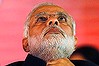 Hindu nationalist Narendra Modi, prime ministerial candidate for India's main opposition Bharatiya Janata Party (BJP) and Gujarat's chief minister, attends their national council meeting at Ramlila ground in New Delhi January 19, 2014. REUTERS/Adnan Abidi (INDIA - Tags: POLITICS)