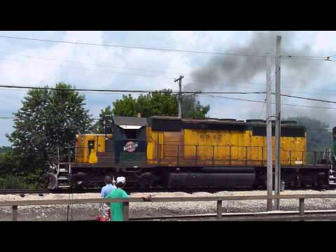 CNW SD40-2 6847 under-Full throttle power run dragging BN 5358