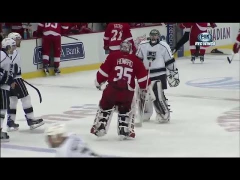 Quick and Howard exchange words at mid-ice