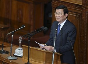 Vietnamese President Truong Tan Sang gives a speech at the diet in Tokyo Tuesday, March 18, 2014. Sang is on a four-day state visit to Japan.