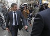 Former trader Jerome Kerviel leaves his lawyer's office in Paris, Wednesday, Oct. 24, 2012.