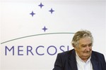 Uruguay's President Jose Mujica is named president of the South American trading bloc Mercosur, during their summit at the Itamaraty Palace, in Brasilia, Brazil, Friday, Dec. 7, 2012.