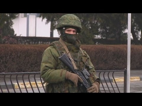 Ukraine crisis: 'Russian forces' seize airports in Crimea region