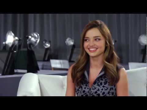 Miranda Kerr gets flirty with Bruno Mars