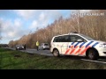 Politiewagen rijdt zich vast in berm; updated 05 Jan 2014; published 05 Jan 2014