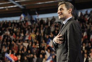 French President and conservative candidate for the 2012 presidential election Nicolas Sarkozy arrives at a campaign meeting Saint-Brice-sous-Foret, north of Paris, Thursday, April 12, 2012