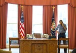 President Barack Obama talks on the phone in the Oval Office with Russian President Vladimir Putin about the situation in Ukraine, March 1, 2014.