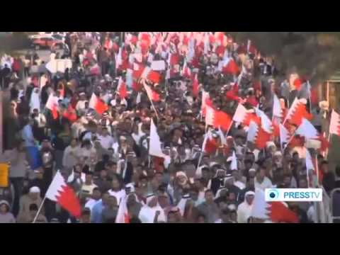 Thousands of pro democracy demonstrators march in Bahrain s capital Manama