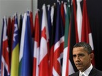 U.S. President Barack Obama speaks during his news conference at the NATO Summit in Lisbon, Portugal, Saturday, Nov. 20, 2010. Obama welcomed Russia's pledge to work with NATO on efforts to build a missile-defense system to protect Europe against a possible missile attack, saying it turns a "source of past tension into a source shared cooperation."