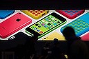 The silhouettes of customers are seen browsing products inside an Apple Inc. store in New York, U.S., on Thursday, Jan. 23, 2014. Photographer: Ron Antonelli/Bloomberg