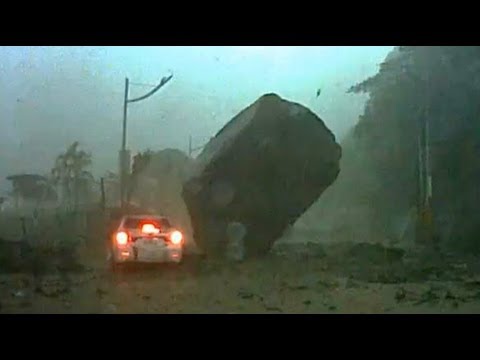 Mountain Collapses - Giant boulder almosts crushes car