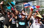 Thousands of anti-government protesters march in Bangkok