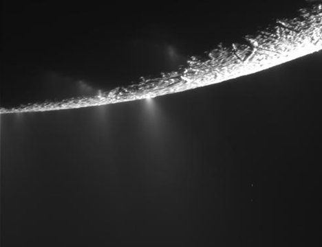 This unprocessed image was captured by NASA's Cassini spacecraft during its Nov. 21, 2009 flyby of Saturn's moon Enceladus. It shows the moon's south polar region, where jets of water vapor and other particles spew from fissures on the surface.