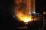 A fire burns at a restaurant after an earthquake in Iquique, Chile, Tuesday, April 1, 2014.