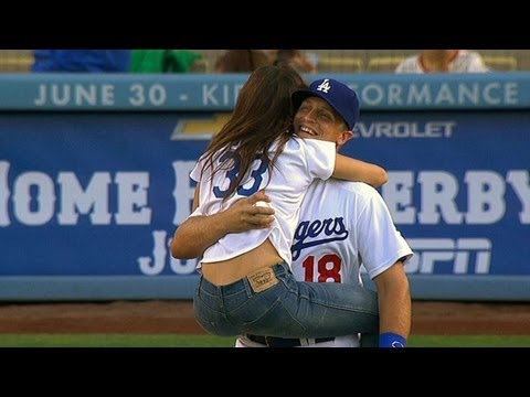 Sarah Shahi leaps into Federowicz's arms after first pitch