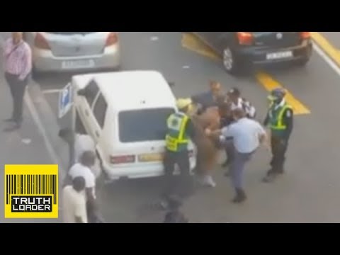 South African police kick and slap naked man in the groin - Truthloader