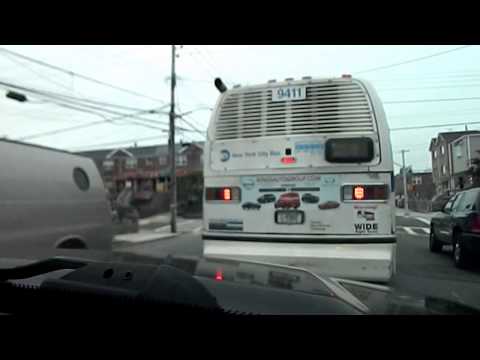 Following 1998 NovaBUS T80206 RTS-06 #9411 on the B64