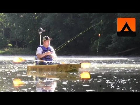 Fishing from a cardboard boat