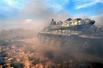 In this photo released on Sunday, April 13, 2014 by the Syrian official news agency SANA, a Syrian forces tank arrives to take position during clashes with Syrian rebels, near the town of Rankous, Syria.