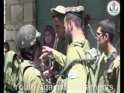 Israeli Soldiers arresting and beating children in Hebron