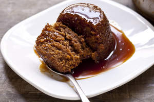 Spiced apple and ginger pudding with butterscotch sauce.