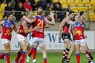 Brisbane's Trent West and Daniel Merrett celebrate a goal.
