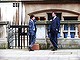 Behind London's Royal Courts of Justice these dapper lawyers ruminate over a well-earned pint. It all looked so perfectly proper, until I noticed the hole in the sole of the little bloke's shoe.