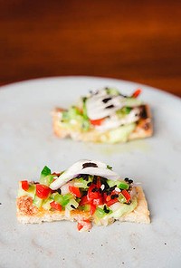 Tostadas with baby sardines.