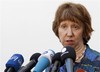 European foreign policy chief Catherine Ashton talks with journalists as she arrives for a Informal Meeting of EU Ministers for Foreign Affairs at the National Museum – Palace of the Grand Dukes of Lithuania in Vilnius, Lithuania, Friday, Sept. 6, 2013.