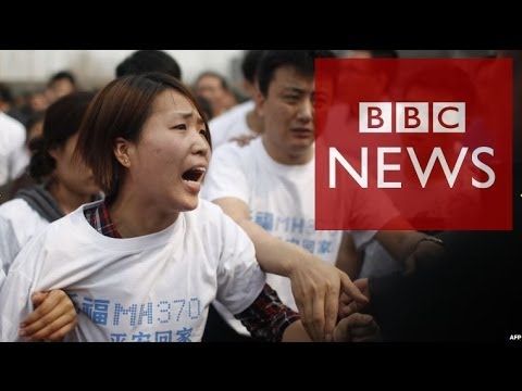 MH370 relatives demand 'answers' during protest in Beijing - BBC News