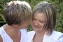 Hayley Wilson and Samantha Hermes embrace after getting married in Canberra.