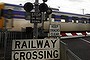 Generic level crossing with a  boom gate blackspot - Train intersection - Railway crossing on Main Street West in St Albans - Traffic moves through the intersection despite the boom gates lowering and the lights flashing. 
Picture by Paul Rovere