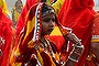 Pushkar, India. In the midst of the heat, dust and camel dung at the Pushkar Camel Fair in India, relief was found in the grace and colour of these barefoot schoolgirls preparing to perform a traditional dance.