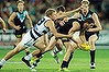 Port's Travis Boak wins the ball against Geelong's Taylor Hunt at Adelaide Oval.