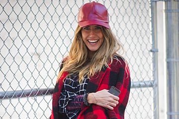 NEW YORK, NY - FEBRUARY 11:  Martha Graeff seen wearing a coat from Asos a skirt from Nasty Gal a hat from American Apparel and shoes from Saint Laurent  on the Streets of Manhattan on February 11, 2014 in New York City.  (Photo by Timur Emek/Getty Images)