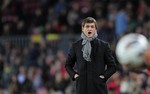 FC Barcelona's coach Tito Vilanova looks on during a Spanish La Liga soccer match against Levante at the Camp Nou stadium in Barcelona, Spain, Saturday, April 20, 2013.