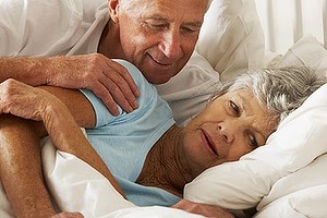 Senior Man Tries To Be Affectionate Towards Wife In Bed