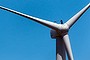 A technician stands on a wind turbine nacelle at Capital Wind Farm in Bungendore, Australia, on Wednesday, Dec. 22, 2010. The wind farm comprises 67 2.1MW wind turbines with a total installed capacity of 140.7MW, which is equivalent to providing the energy needs of approximately 60,000 homes. The electricity generated at the Capital Wind Farm is fed directly into the TransGrid network via an onsite substation, with the majority of output going on to supply the Sydney Desalination Plant at Kurnell. 
Photographer: Ian Waldie/Bloomberg