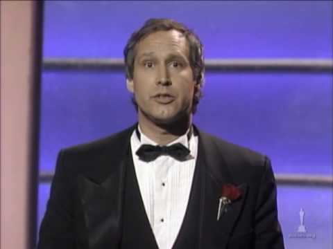 Chevy Chase hosting the 59th Academy Awards®