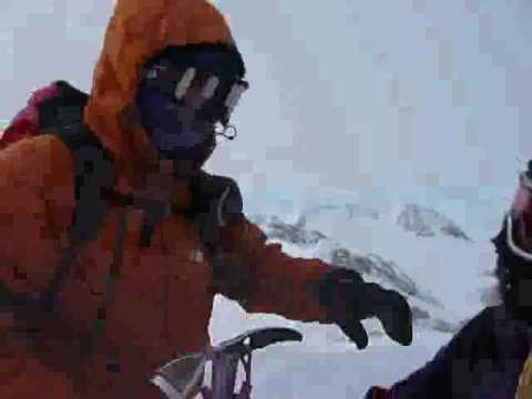 Byron Smith standing on Mount Vinson Summit in Antarctica 2008