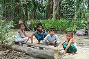 Children play in the shadow of an established palm oil plantation at Kaloy village, south-eastern Aceh, Indonesia. Pic taken 31 March, 2014, by Michael Bachelard