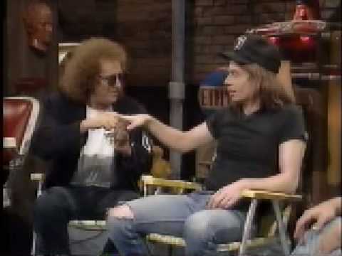 Mike Myers as Wayne: The History of Handshakes