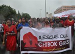 Women attend a demonstration calling on the government to rescue kidnapped schoolgirls of a government secondary school Chibok, in Abuja, Nigeria. Wednesday, April 30, 2014.