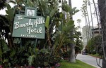 In this April 25, 2012 file photo, the entrance to the Beverly Hills Hotel is seen in Beverly Hills, Calif. Hollywood is responding to harsh new laws in Brunei by boycotting the Beverly Hills Hotel.