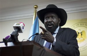 South Sudan's President Salva Kiir speaks to the media at a press conference in Juba, South Sudan Monday, Jan 20, 2014. Negotiators for Kiir and former Vice President Riek Machar told reporters over the weekend that a cease-fire was close at hand, but a Twitter feed believed controlled by Machar said Monday there won't be a cease-fire until Ugandan troops leave the country and political detainees are released.